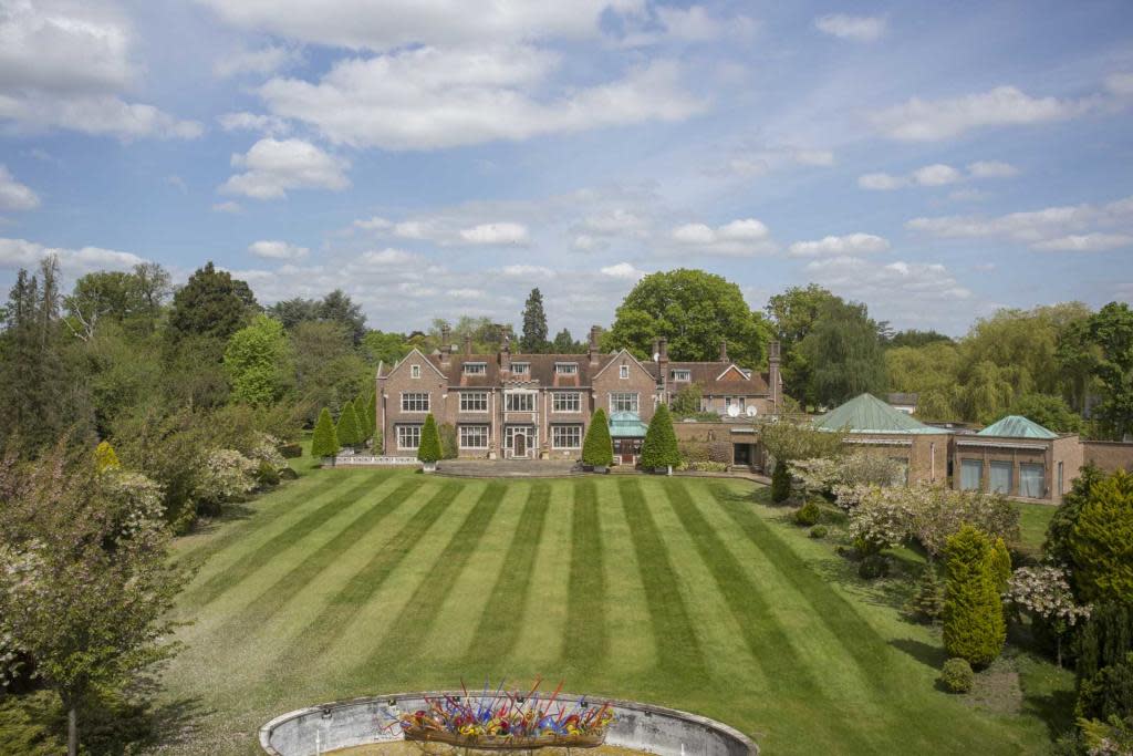 This 12-bedroom, 12-bathroom country house is set in an exclusive area of Egham, Surrey. Photo: Rightmove