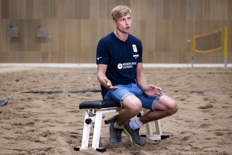 Dutch volleyball player Steven van de Velde gestures while addressing the media during a press conference at the European Beach Volleyball Championship in The Hague on August 13, 2024, after his participation in the 2024 Olympic Games in Paris. (Photo by Ramon van Flymen / ANP / AFP) / Netherlands AWAY (Photo by RAMON VAN FLYMEN/ANP/AFP via Getty Images)