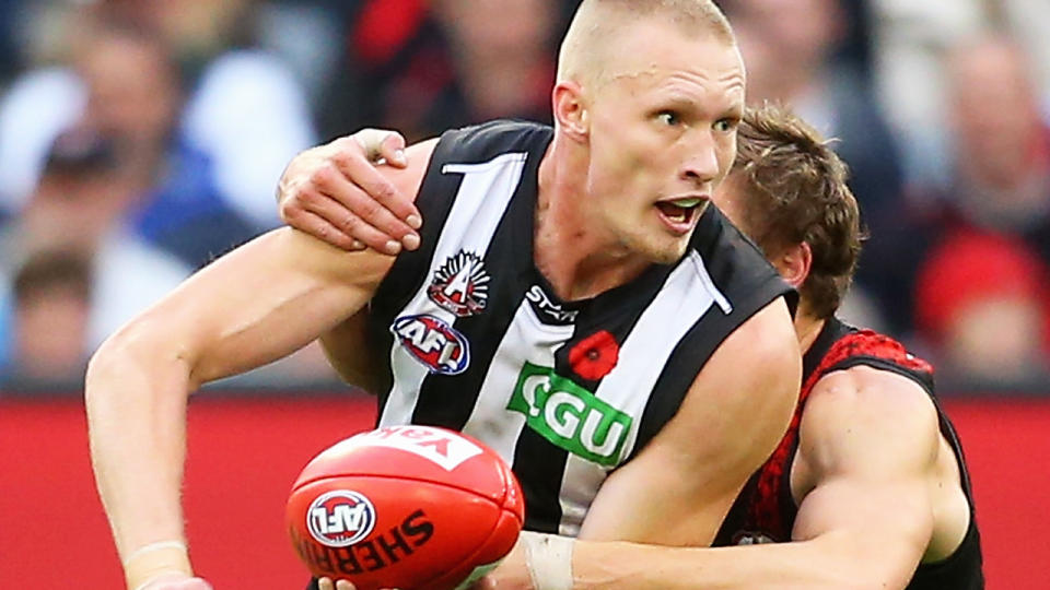 Former Collingwood defender Jack Frost is pictured playing against Essendon in the 2015 ANZAC Day game.