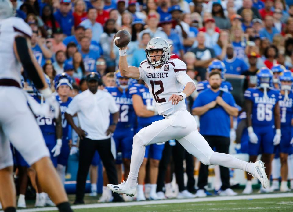 Missouri State's Jacob Clark (12) makes a pass as the Bears take on the University of Kansas Jayhawks at David Booth Kansas Memorial Stadium in Lawrence Kansas on Friday, Sept. 1, 2023.