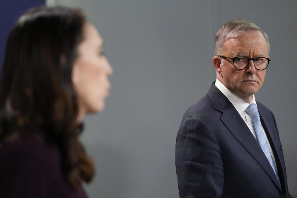 Australian Prime Minister Anthony Albanese, right, looks towards New Zealand Prime Minister Jacinda Ardern during a joint press conference with in Sydney, Australia, Friday, June 10, 2022. Ardern is on a two-day visit to Australia. (AP Photo/Mark Baker)