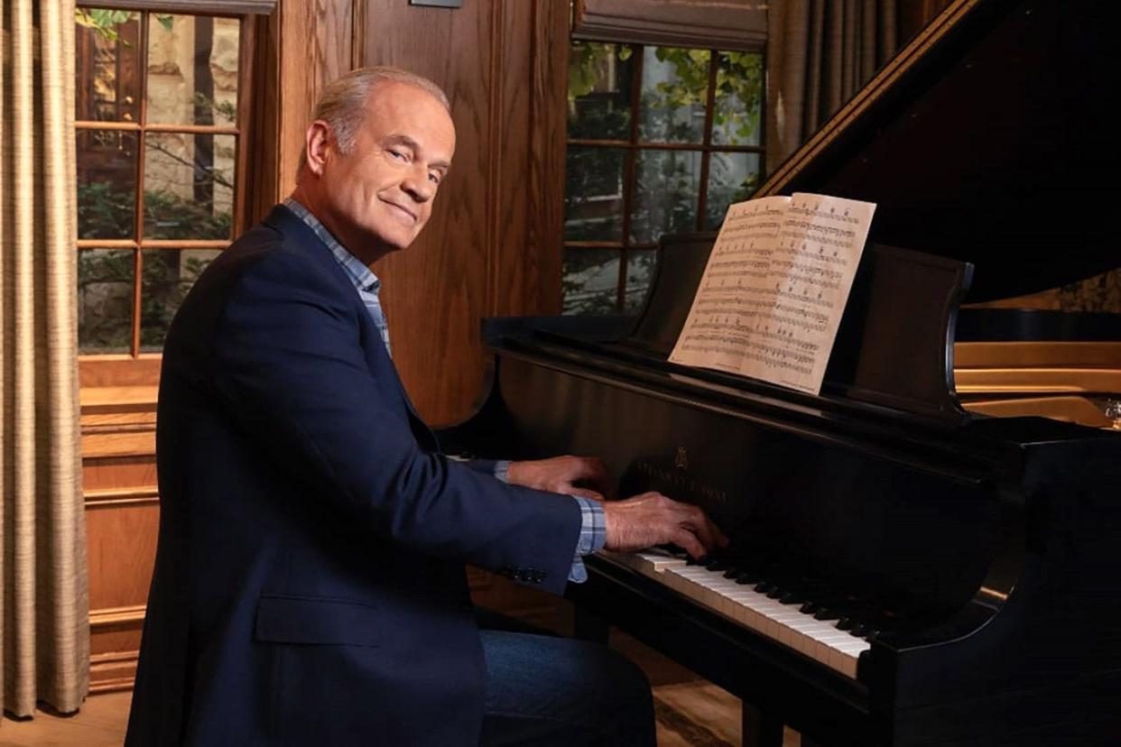 Kelsey Grammer as Frasier playing a piano.