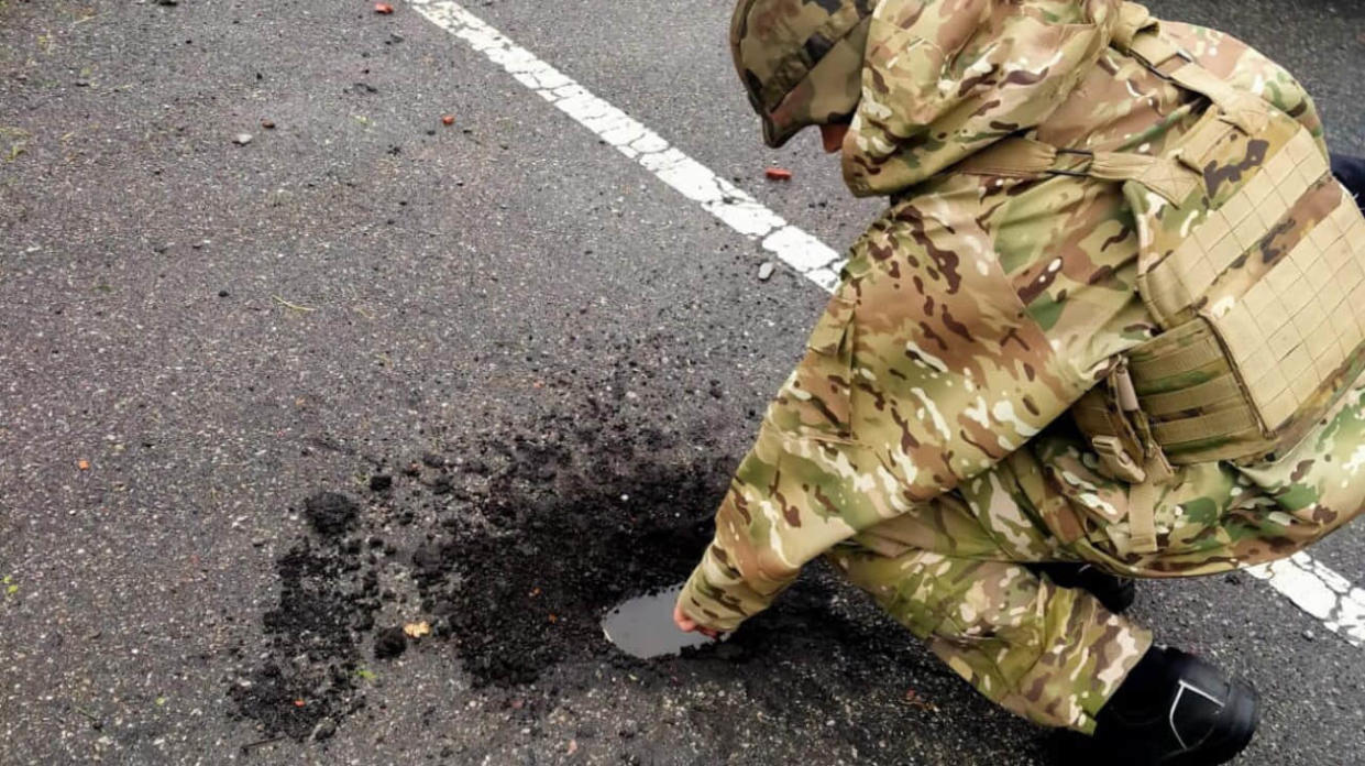 Trace from cluster munition detonation. Photo: National Police