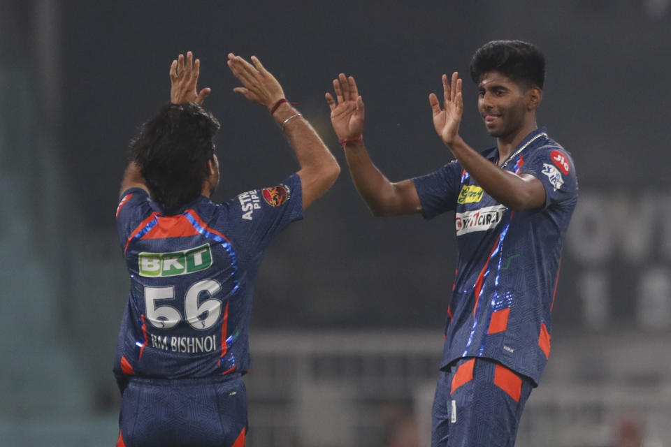 Lucknow Super Giants' Mayank Yadav, right, celebrates the dismissal of Punjab Kings' Jitesh Sharma during the Indian Premier League cricket match between Lucknow Super Giants and Punjab Kings in Lucknow, India, Saturday, March 30, 2024.(AP Photo/Pankaj Nangia)