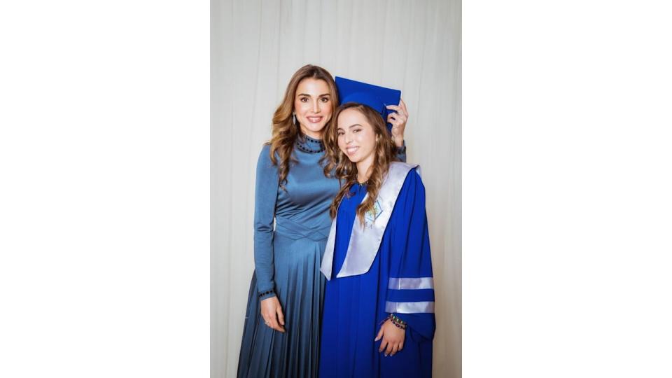 Queen Rania with Princess Salma in a blue graduation gown