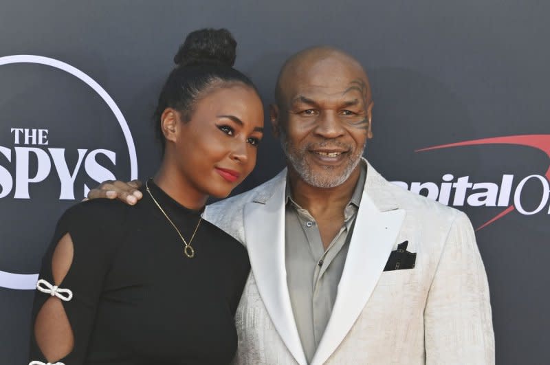 Mike Tyson, seen with daughter Milan Tyson, plays an EMS Chief in "Asphalt City." File Photo by Jim Ruymen/UPI