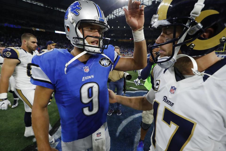 Detroit Lions QB Matthew Stafford (9) wasn't too pleased when the Los Angeles Rams fired off the line in the victory formation. (AP)