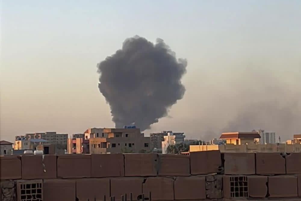 In this photo provided by Maheen S, smoke fills the sky in Khartoum, Sudan, near Doha International Hospital on Friday, April 21, 2023. (Maheen S via AP)