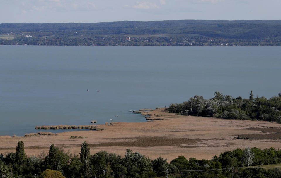 Lake Balaton in Csopak, Hungary on May 18, 2021. Lake Balaton is the largest lake in Central Europe and one of Hungary's most cherished natural treasures. But some worry that the lake's fragile ecosystem and the idyllic atmosphere of the quaint villages dotted along its banks are in danger because of speculative developments. (AP Photo/Laszlo Balogh)