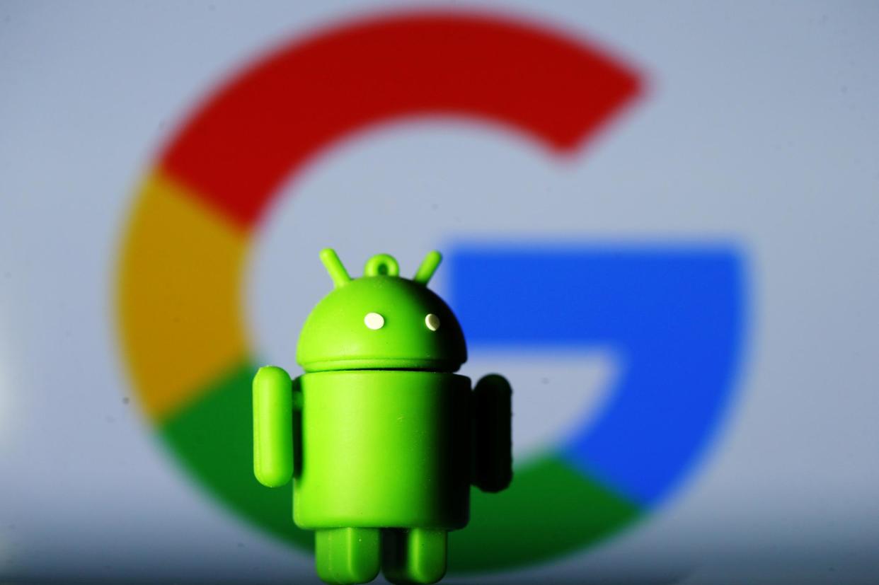 A 3D printed Android mascot Bugdroid is seen in front of a Google logo: REUTERS