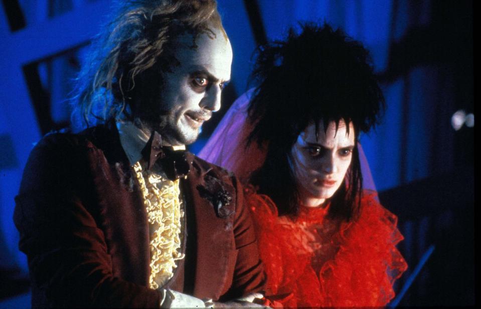 michael keaton as beetlejuice and winona ryder as lydia