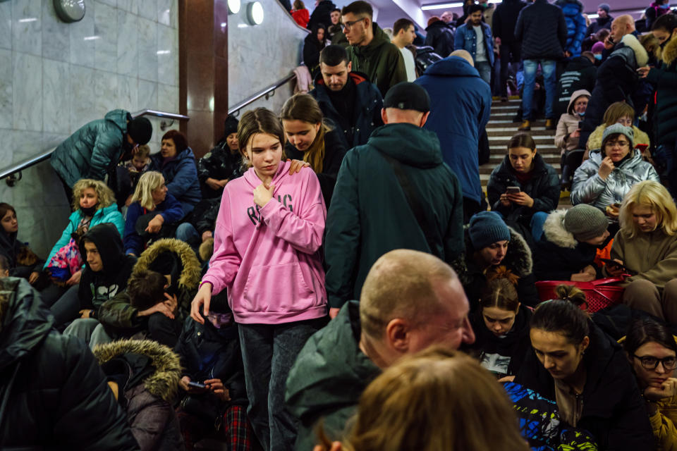 KHARKIV, UKRAINE -- FEBRUARY 24, 2022: Hundreds of people seek shelter underground, on the platform, inside the dark train cars, and even in the emergency exits, in metro subway station as the Russian invasion of Ukraine continues, in Kharkiv, Ukraine, Thursday, Feb. 24, 2022. (MARCUS YAM / LOS ANGELES TIMES)