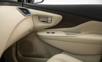 <p>New interior trim finds the SV and SL models getting either metallic or light faux-wood inserts and the Platinum wearing dark teak wood accents.</p>