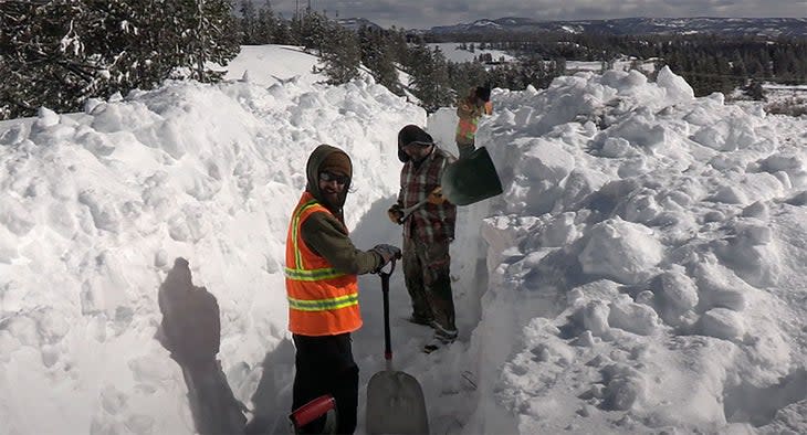 <span class="article__caption">Members of Buffalo Field Campaign dig a snow trench outside West Yellowstone, Montana. </span> (Photo: Buffalo Field Campaign )