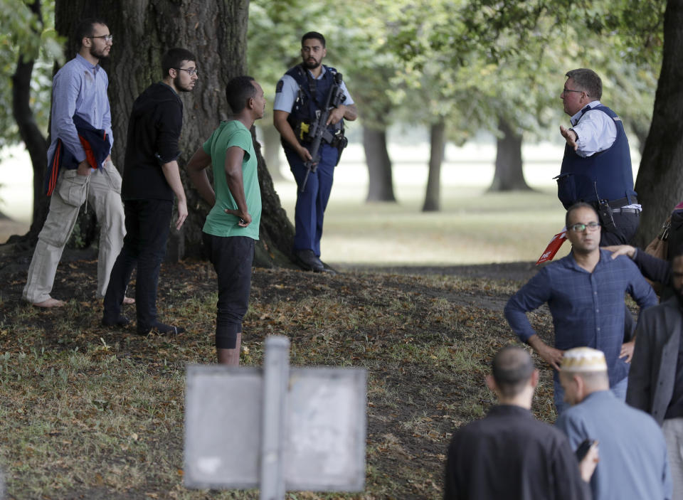 Police attempt to move people away from outside a mosque in central Christchurch after a mass shooting in New Zealand on March 15, 2019.&nbsp;