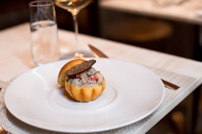 <p>This elegant seafood restaurant, headed by chef Eric Ripert, has topped many “best of” lists and has several accolades under its belt, including repeat <a href="http://www.nytimes.com/2012/05/23/dining/reviews/le-bernardin-in-midtown-manhattan.html?pagewanted=all&_r=0" rel="nofollow noopener" target="_blank" data-ylk="slk:four-star reviews from The New York Times;elm:context_link;itc:0;sec:content-canvas" class="link ">four-star reviews from The New York Times</a> (<a href="http://www.nytimes.com/1986/03/28/arts/restaurants-023486.html?action=click&module=Search®ion=searchResults%230&version=&url=http%3A%2F%2Fquery.nytimes.com%2Fsearch%2Fsitesearch%2F%23%2FBryan%2BMiller%2BLe%2BBernardin%2Ffrom19851108to19860404%2F" rel="nofollow noopener" target="_blank" data-ylk="slk:the first of them;elm:context_link;itc:0;sec:content-canvas" class="link ">the first of them</a> written only a few months after its opening), perfect food ratings in the Zagat guide from 2011 to 2013, and more James Beard Awards than any other restaurant in <a href="http://www.thedailymeal.com/new-york-restaurant-guide" rel="nofollow noopener" target="_blank" data-ylk="slk:New York City;elm:context_link;itc:0;sec:content-canvas" class="link ">New York City</a>. Ripert is an artist working with impeccable raw materials. The four-course, $140 prix fixe dinner features a list of delicacies from the sea, ranging from “almost raw” first courses to “lightly cooked” mains to (if you insist) “upon request” dishes like duck, lamb, and filet mignon. A seven course, $180 Le Bernardin tasting and an eight-course, $215 Chef’s Tasting are also available. Eat in <a href="http://www.thedailymeal.com/le-bernardin" rel="nofollow noopener" target="_blank" data-ylk="slk:Le Bernardin;elm:context_link;itc:0;sec:content-canvas" class="link ">Le Bernardin</a>’s recently revamped modern dining room against a backdrop of painted waves and enjoy dishes like layers of thinly pounded yellowfin tuna, Iberico ham “chutney,” sea beans, and lemon olive oil; warm king fish sashimi with caviar in a light marinière broth; grilled escolar and seared wagyu beef with fresh kimchi, Asian pear, and soy-citrus emulsion.<i> (Photo: Le Bernardin / <a href="https://www.facebook.com/Le-Bernardin-114069558624377" rel="nofollow noopener" target="_blank" data-ylk="slk:Facebook;elm:context_link;itc:0;sec:content-canvas" class="link ">Facebook</a>)</i></p><p><b>More: <a href="http://www.thedailymeal.com/eat/101-best-restaurants-america-2016-slideshow" rel="nofollow noopener" target="_blank" data-ylk="slk:101 Best Restaurants in America for 2016 (Slideshow);elm:context_link;itc:0;sec:content-canvas" class="link ">101 Best Restaurants in America for 2016 (Slideshow)</a></b><br></p>