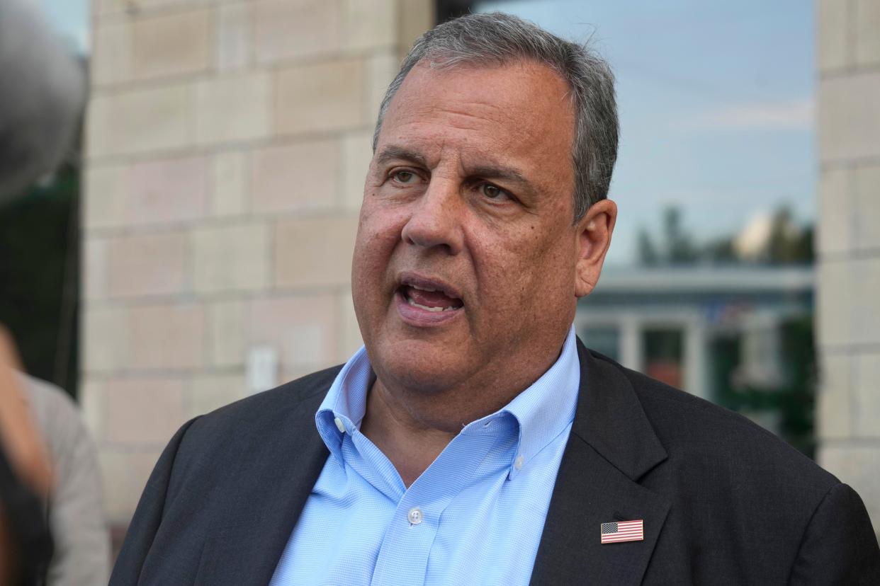 Republican presidential candidate former New Jersey Gov. Chris Christie speaks with reporters outside the Child Rights Protection Center in Kyiv, Ukraine, Friday, Aug. 4, 2023. (AP Photo/Efrem Lukatsky)