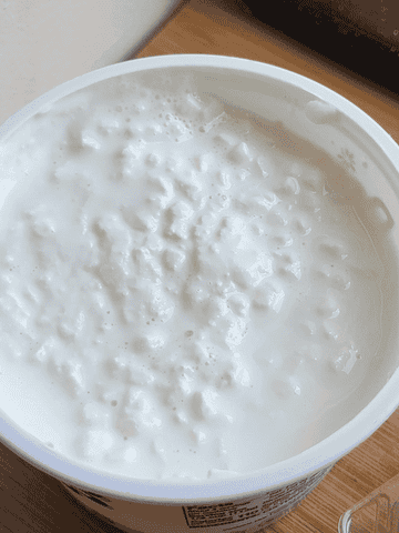 GIF of zooming in on cottage cheese