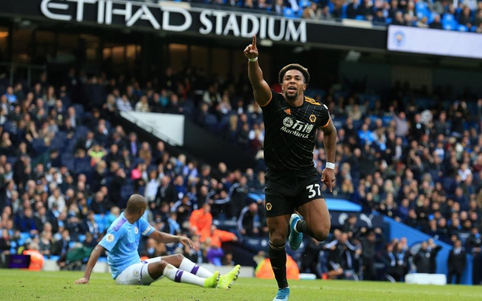 Wolverhampton Wanderers' Spanish striker Adama Traore celebrates scoring his team's second goal during the English Premier League football match between Manchester City and Wolverhampton Wanderers  - AFP