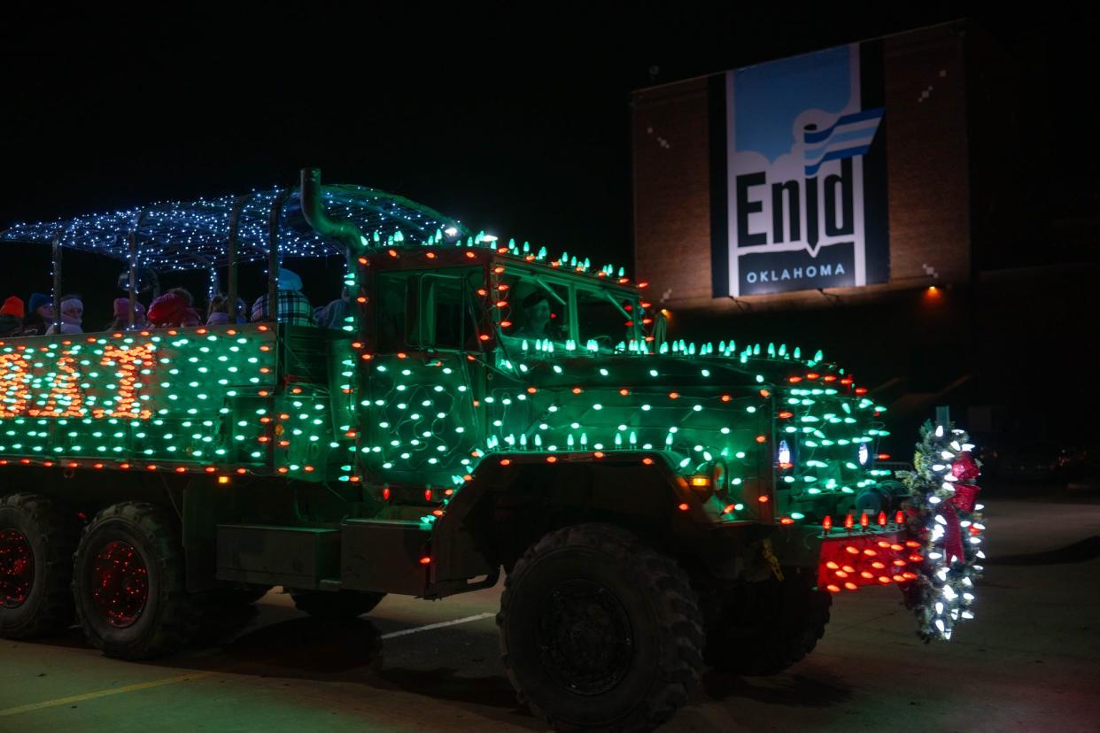 The 2023 holiday festivities in Enid include rides on the BAT - or Big Adventure Train - Express, a 1985 5-ton Army truck covered in more than 3,500 lights.