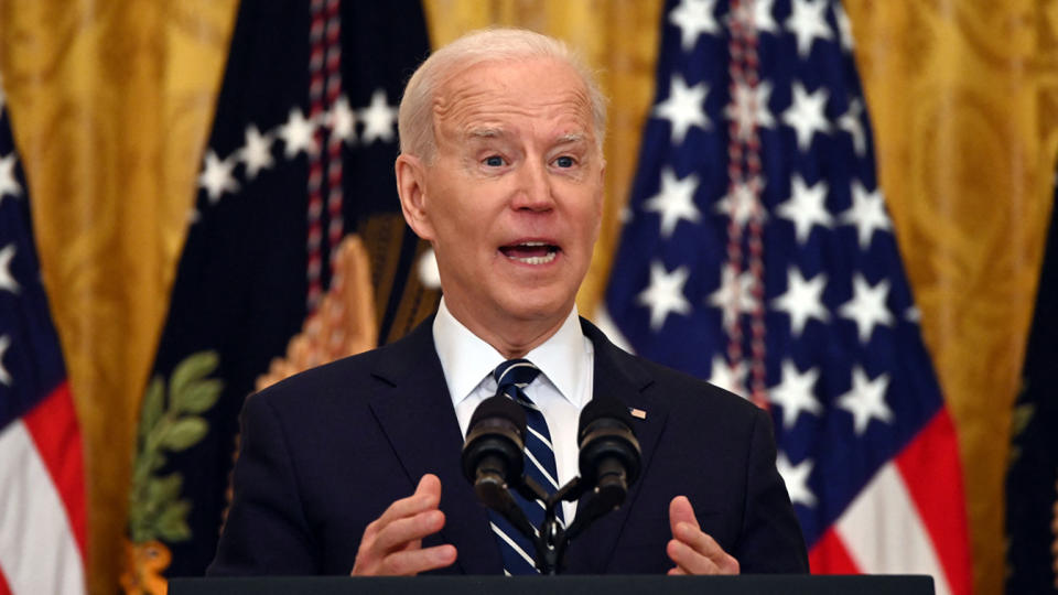 US President Joe Biden answers a question during his first press briefing in the East Room of the White House in Washington, DC, on March 25, 2021. (Jim Watson/AFP via Getty Images)