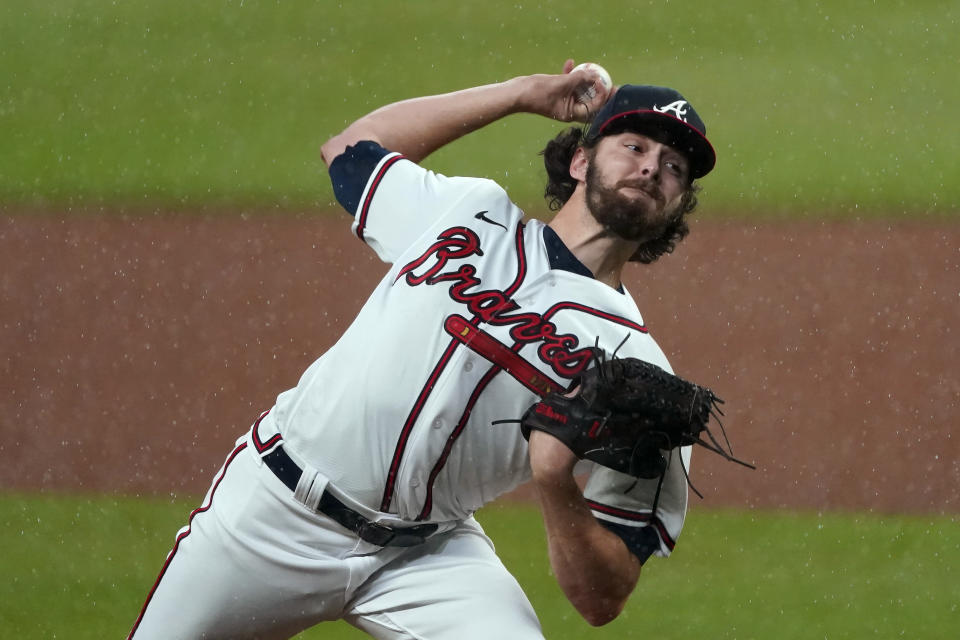 Atlanta Braves starting pitcher Ian Anderson works against the Miami Marlins during the first Inning of a baseball game Thursday, Sept. 24, 2020, in Atlanta. (AP Photo/John Bazemore)