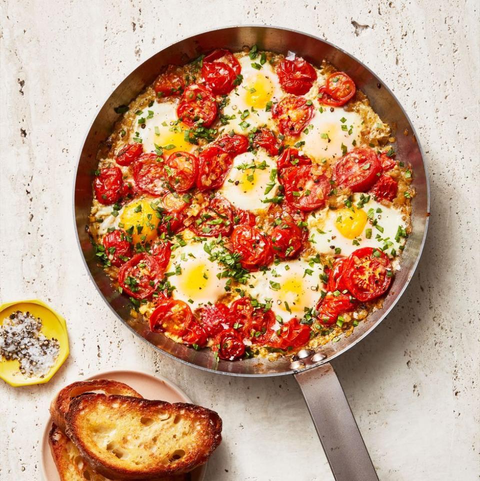 <p>Just wait until you break this one out at the breakfast table: jammy tomatoes, runny yolks and plenty of toasted bread for dipping. </p><p>Get the <a href="https://www.goodhousekeeping.com/food-recipes/a34908201/easy-shakshuka-recipe/" rel="nofollow noopener" target="_blank" data-ylk="slk:Shakshuka recipe;elm:context_link;itc:0;sec:content-canvas" class="link "><strong>Shakshuka recipe</strong></a><em>.</em></p>