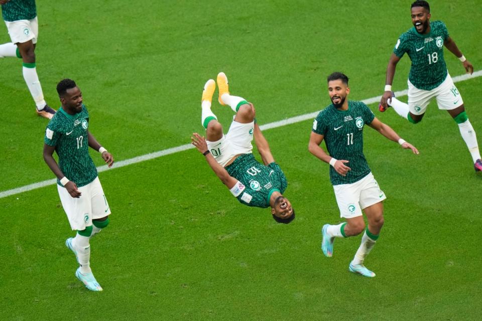 Saudi Arabia’s Salem Al-Dawsari celebrates after scoring his side’s second goal (AP)