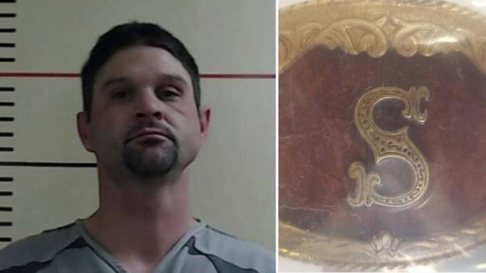 Mugshot of David Shawn Minze with a picture of belt buckle bearing the letter 'S'. 