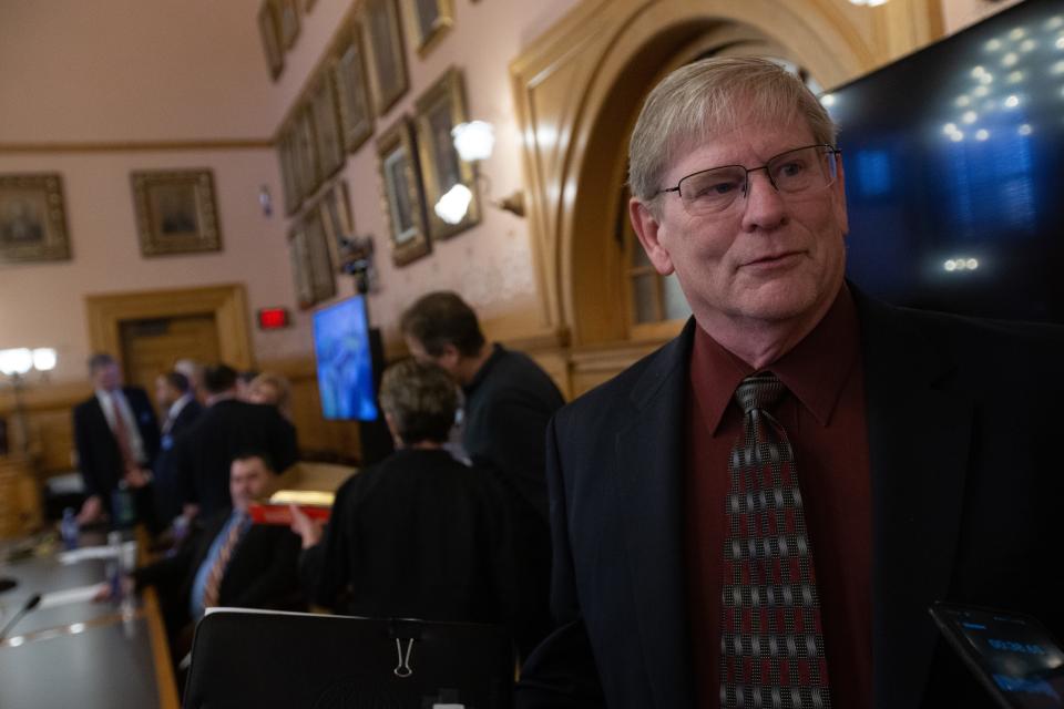 Rep. Leo Delperdang, R-Wichita, chairman of the House Energy, Utilities and Telecommunications Committee, answers questions from the media following Tuesday's committee hearing on the December oil spill in Washington County.