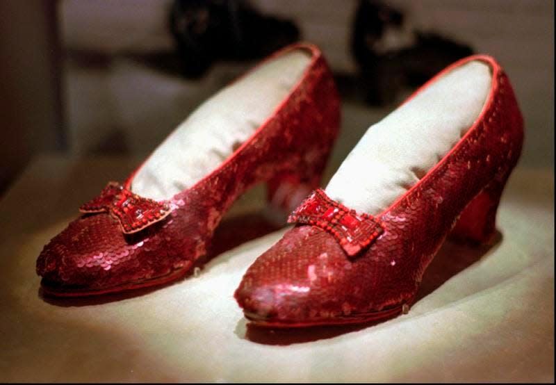 This 1996 photo shows one of the four pairs of ruby slippers worn by Judy Garland in the 1939 film "The Wizard of Oz" on display during a media tour of the "America's Smithsonian" traveling exhibition in Kansas City, Mo.