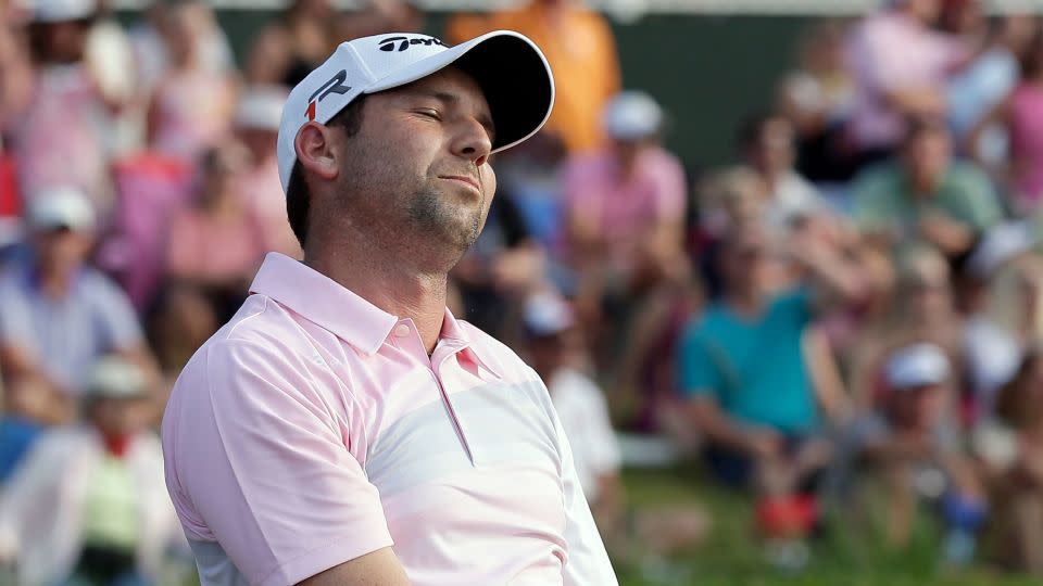 García reacts to sending his second consecutive tee shot into the lake. - Chris O'Meara/AP