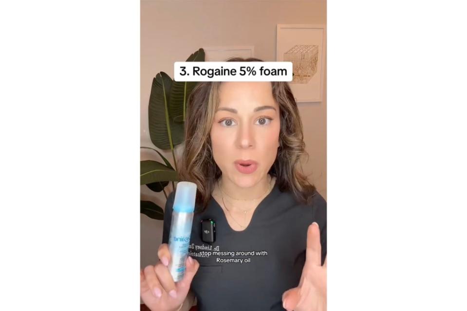 Zubritsky holding Rogaine bottle in her TikTok video Lindsey Zubritsky