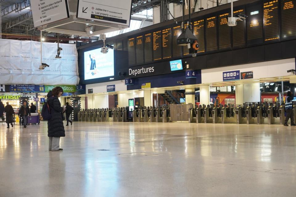 Passengers at Waterloo Station during a previous train strike (PA Wire)