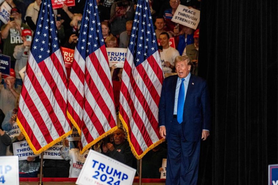 Donald Trump arrives to speak at a campaign rally in Claremont, New Hampshire, on 11 November.