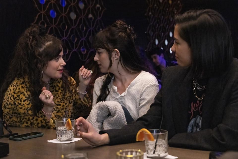 This image released by Max shows Molly Gordon, from left, Dakota Johnson and Sonoya Mizuno in a scene from "Am I Ok?" (James Clark/Max via AP)