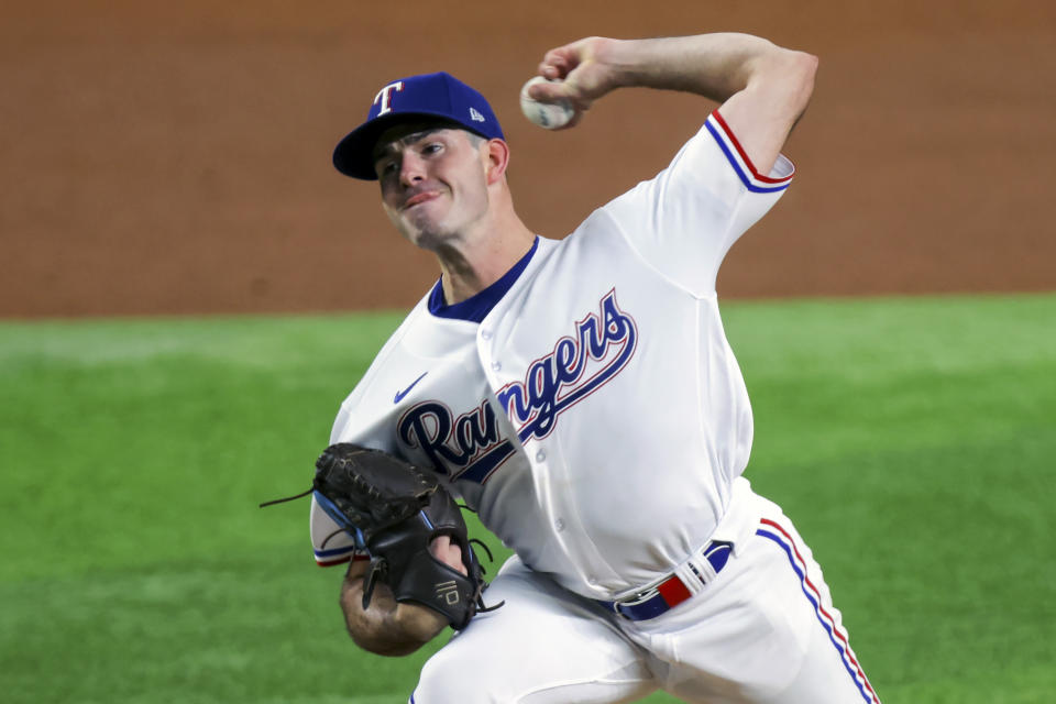 Texas Rangers starting pitcher Cody Bradford throws to the Los Angeles Angels during the fifth inning of a baseball game, Tuesday, June 13, 2023, in Arlington, Texas. (AP Photo/Gareth Patterson)