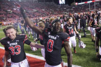 Utah linebacker Devin Lloyd (0) celebrates as he walks off the filed following their NCAA college football game against Arizona State Saturday, Oct. 16, 2021, in Salt Lake City. (AP Photo/Rick Bowmer)