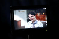 Canada's Prime Minister Justin Trudeau is pictured on a monitor during an interview with Reuters in La Malbaie, Quebec, Canada, May 24, 2018. REUTERS/Chris Wattie