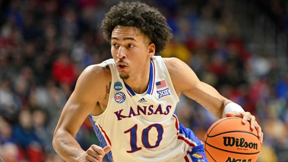 Mar 16, 2023; Des Moines, IA, USA; Kansas Jayhawks forward Jalen Wilson (10) dribbles the ball against the Howard Bison during the first half at Wells Fargo Arena.