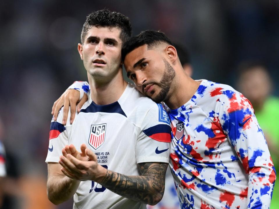 Christian Pulisic and Cristian Roldan look dejected after the USA’s World Cup exit (REUTERS)