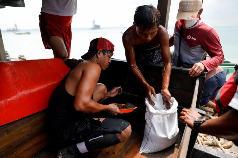 The Wider Image: Mining tin from the sea