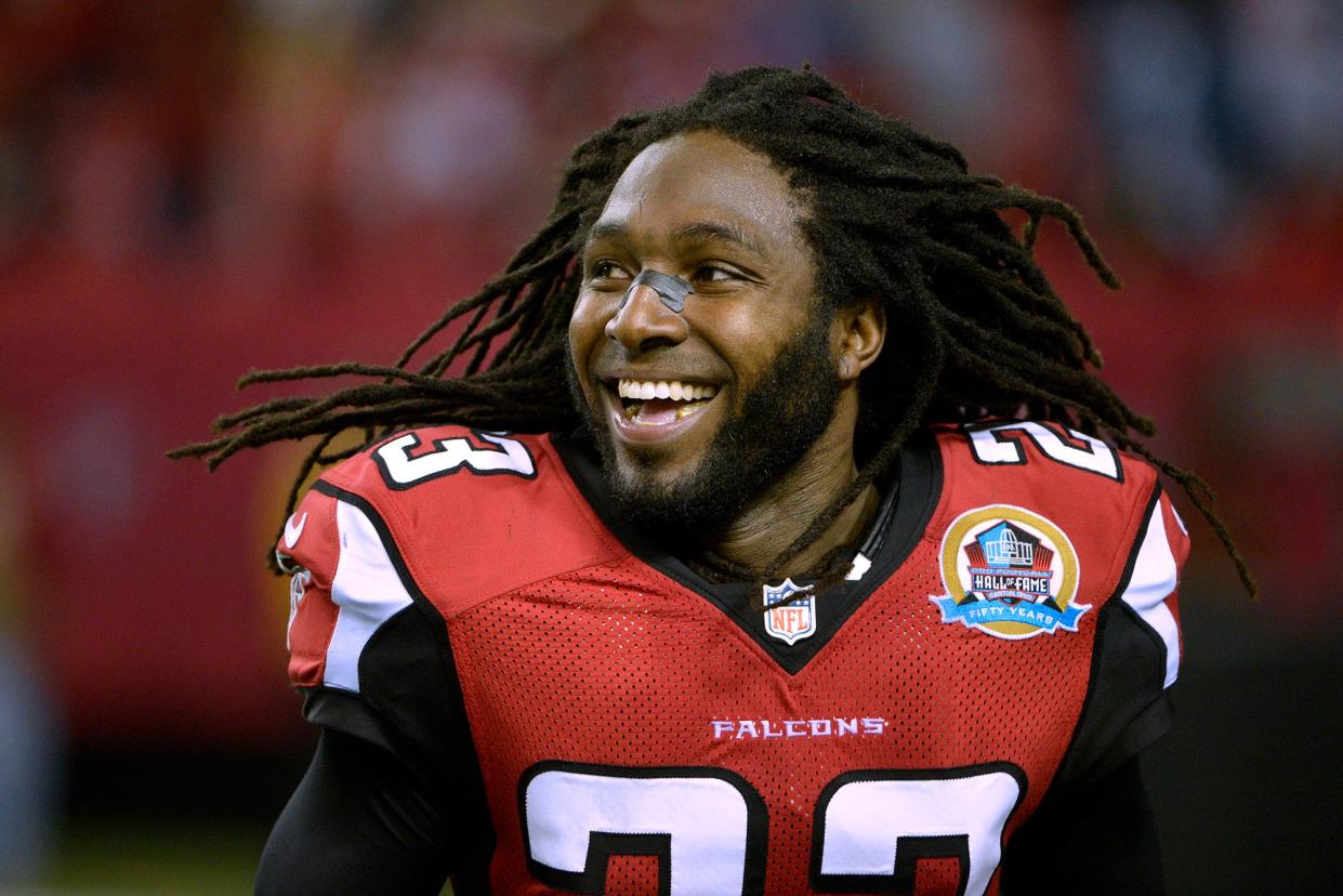 Atlanta Falcons cornerback Dunta Robinson (23) runs onto the field during the second half of an NFL football game against the New York Giants, Sunday, Dec. 16, 2012, in Atlanta.