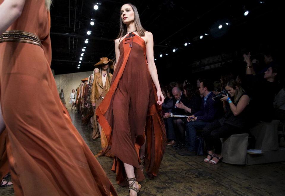 The Donna Karan Spring 2014 collection is modeled during Fashion Week in New York, Monday, Sept. 9, 2013. (AP Photo/Craig Ruttle)