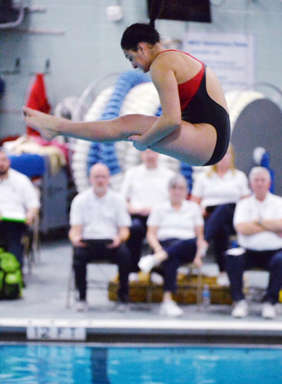 Fairview's Elena Veres competes in the girls District 10 Class 2A diving championships at McDowell High School in Millcreek Township on Feb. 24, 2023. Veres won the event with 255.25 points.