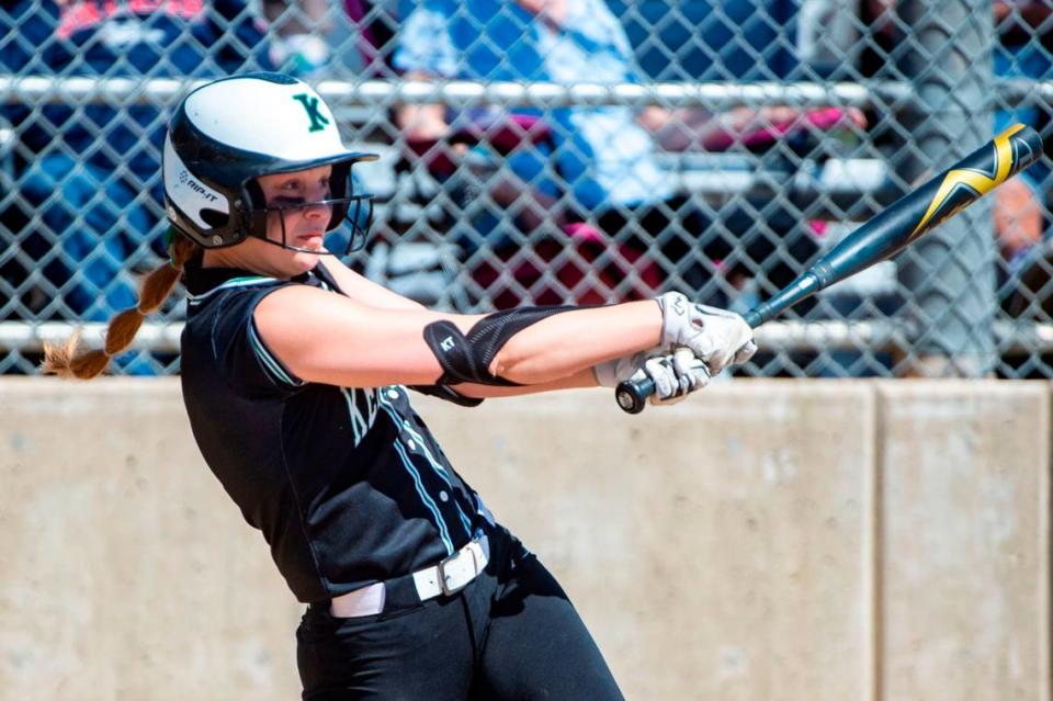 Kentwood’s Sarah Wright hits a 2-run homer in the bottom of the fourth inning of the District 2/3 tournament championship game against Skyview on Saturday, May 21, 2022, at Kent Service Fields in Kent, Wash.