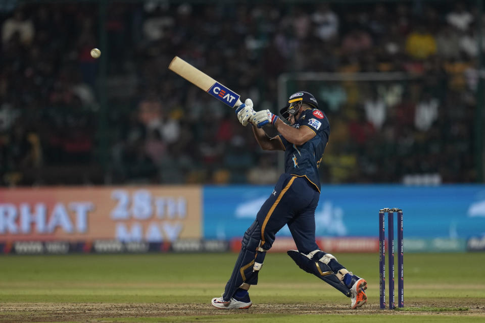 Gujarat Titans' Shubman Gill plays a shot during the Indian Premier League cricket match between Royal Challengers Bangalore and Gujarat Titans in Bengaluru, India, Sunday, May 21, 2023. (AP Photo /Aijaz Rahi)