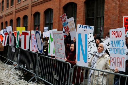 Pro-choice protesters gather to counter an anti-Planned Parenthood vigil outside the Planned Parenthood - Margaret Sanger Health Center in Manhattan, New York, U.S., February 11, 2017. REUTERS/Andrew Kelly