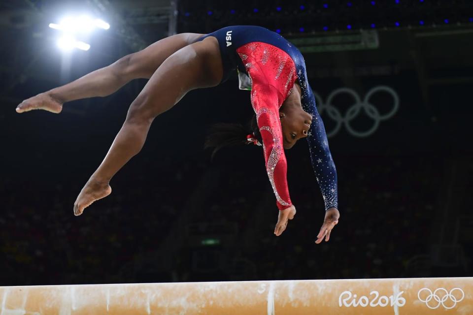 <div class="inline-image__caption"><p>US gymnast Simone Biles competes in the qualifying for the women's Beam event of the Artistic Gymnastics at the Olympic Arena during the Rio 2016 Olympic Games in Rio de Janeiro on August 7, 2016.</p></div> <div class="inline-image__credit">Emmanuel Dunand/Getty</div>