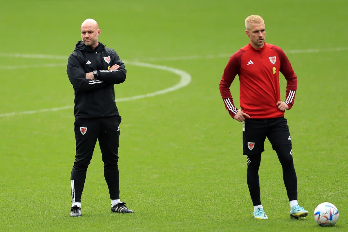 Wales manager Rob Page (left) says Aaron Ramsey (right) will continue his international career in to the 2024 European Championship qualifying campaign (Bradley Collyer/PA) (PA Wire)